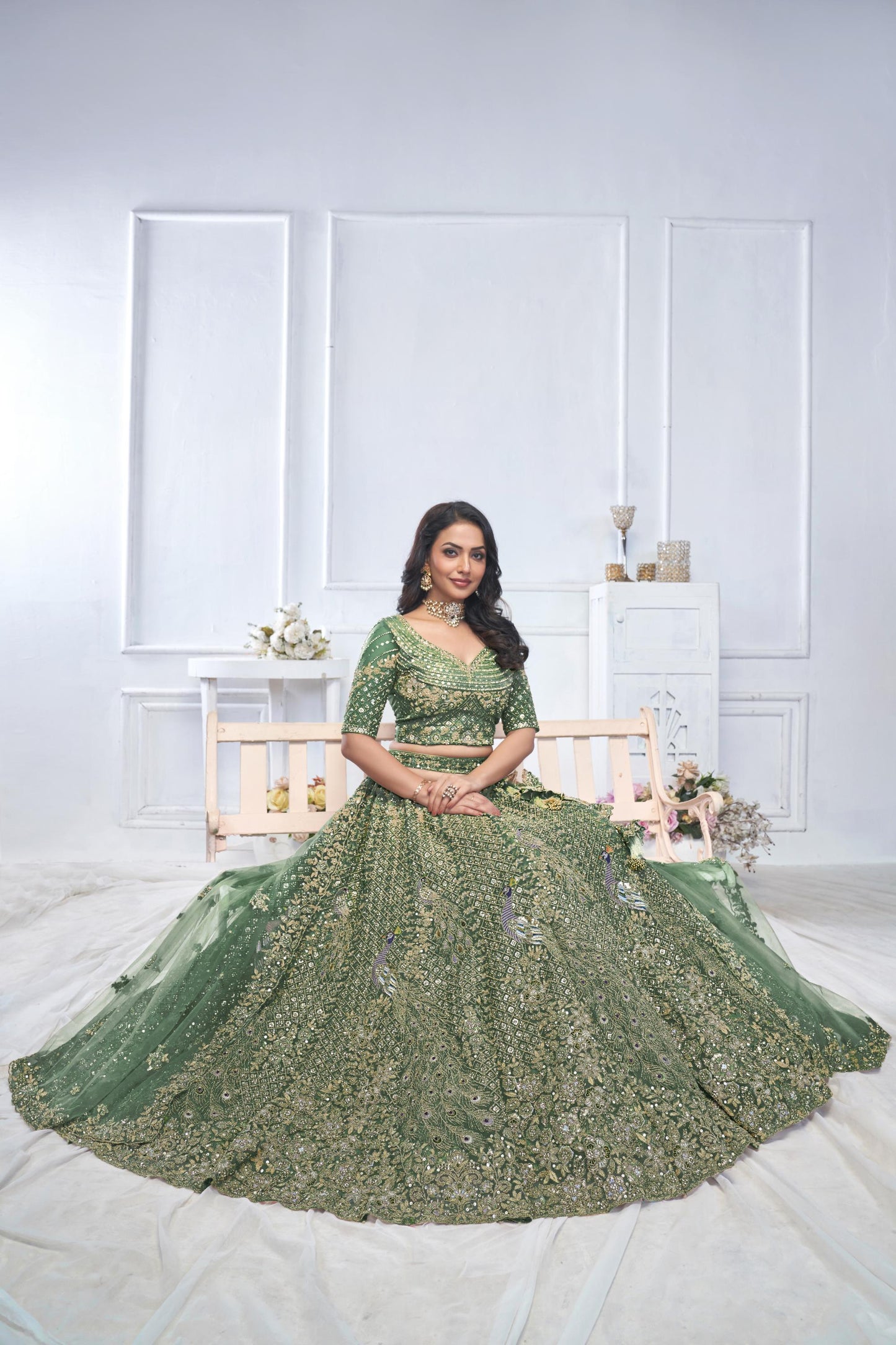Green Heavy Sequins & Zari Embroidered Soft Net Bridal Wear Lehenga