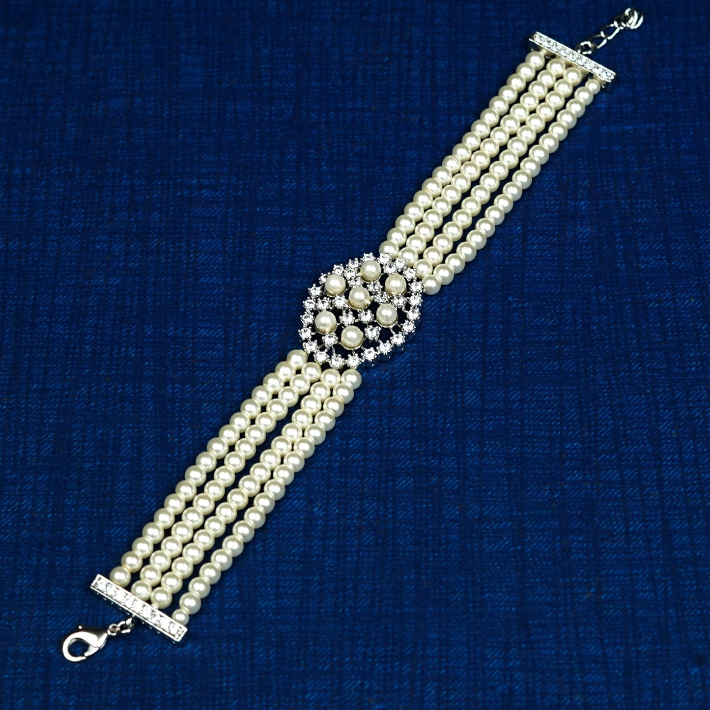 Zevar Club Handcrafted Multi-Strand Pearl Beaded Kundan Studded Floral Motif Premium Bracelet