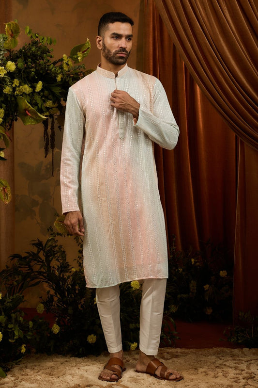 Pista silk kurta pajama set with white embroidery thread and sequin work