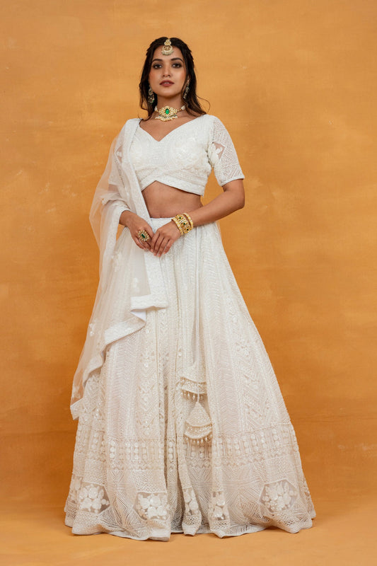 White net lehenga choli with sequin, pearl and cut dana work