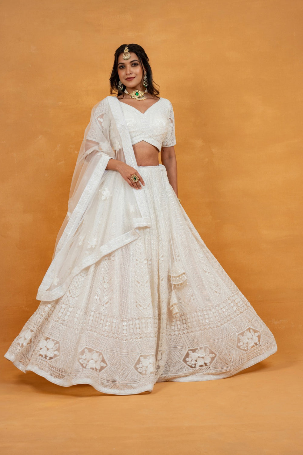 White net lehenga choli with sequin, pearl and cut dana work