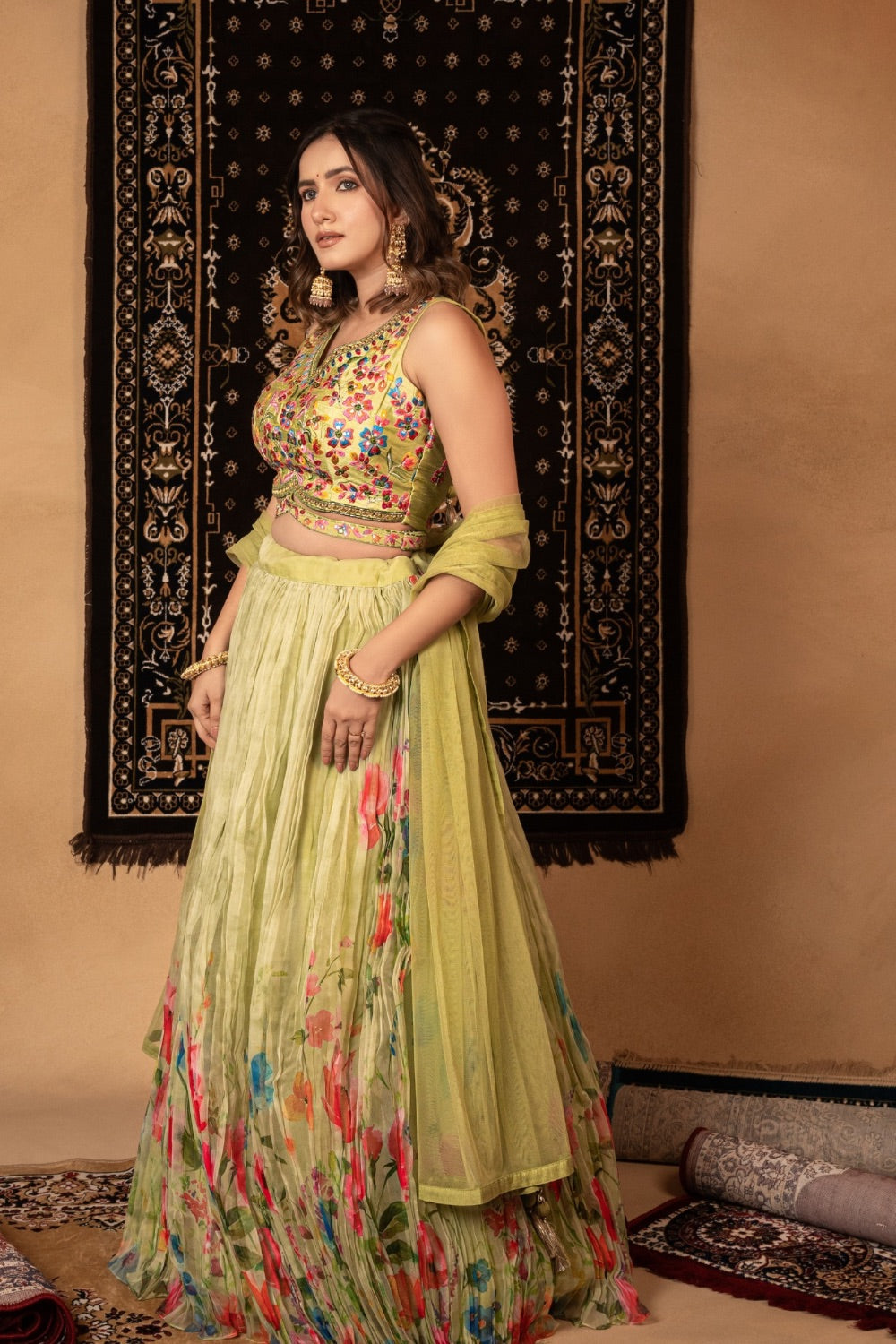 Tea green georgette lehenga choli with resham and mirror work