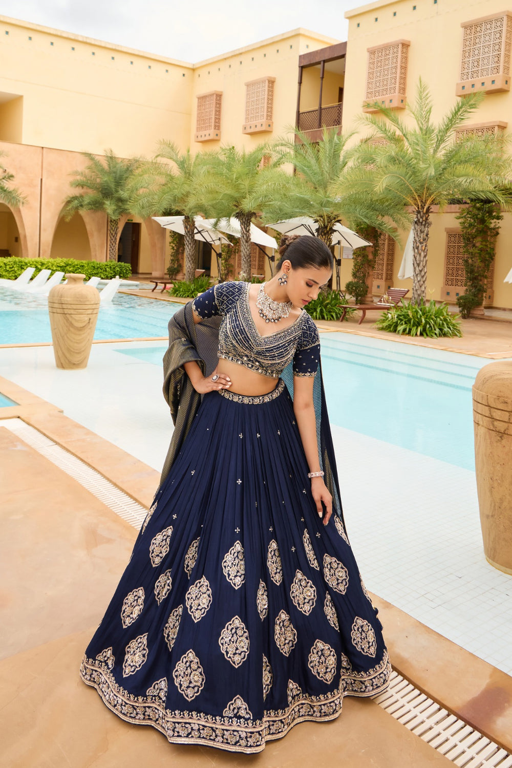 Royal blue silk lehenga choli with golden thread embroidery and sequins work