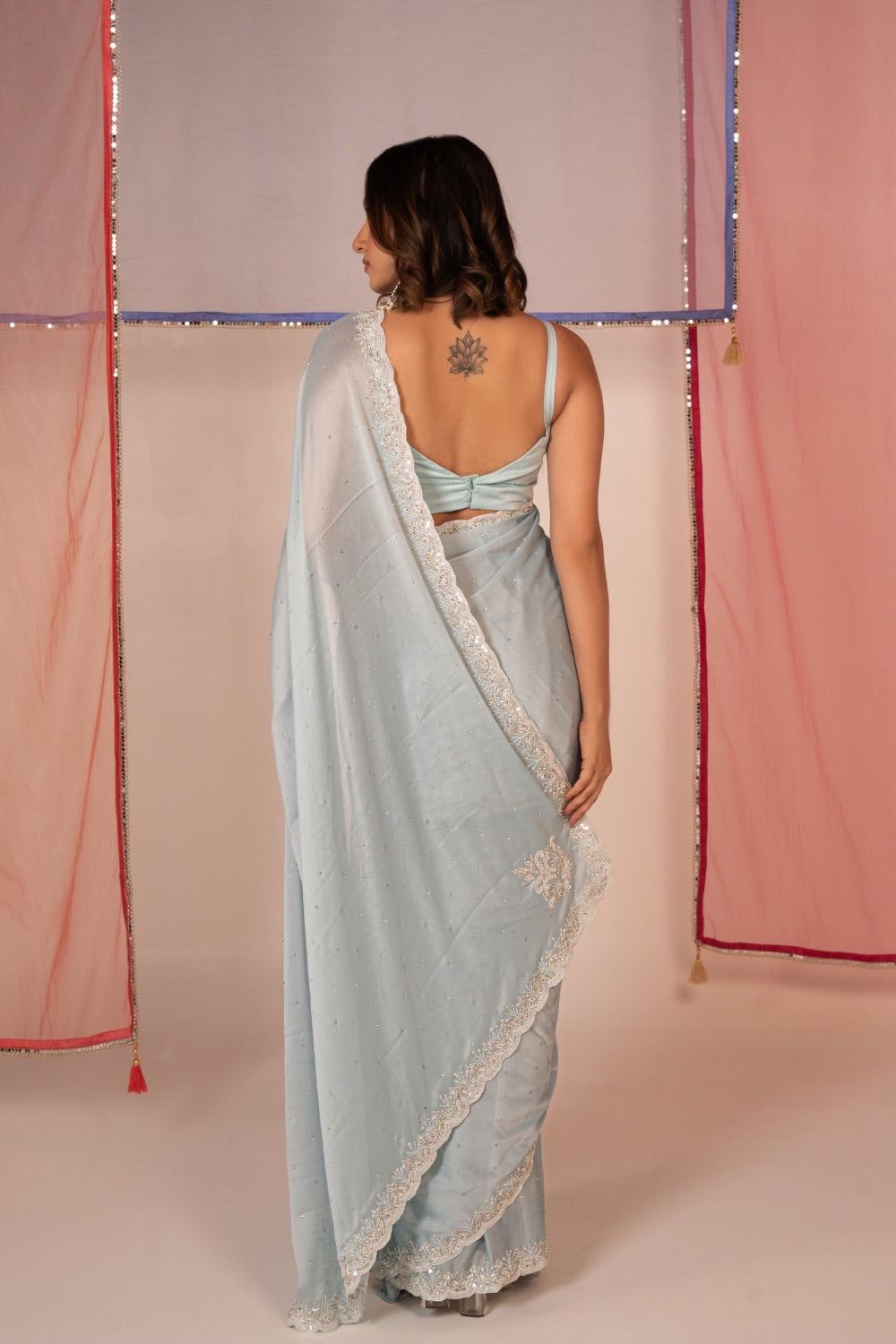 Light blue tissue silk saree and unstitched blouse piece