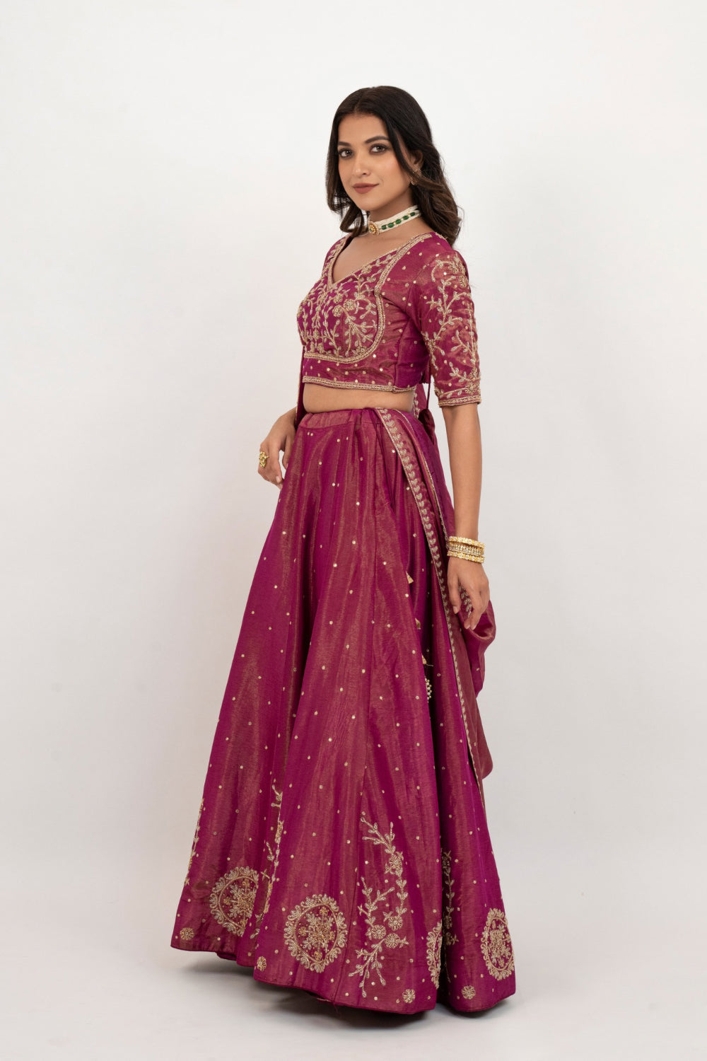 Magenta tissue silk zardozi embroidered lehenga choli with hand cut dana and beads work