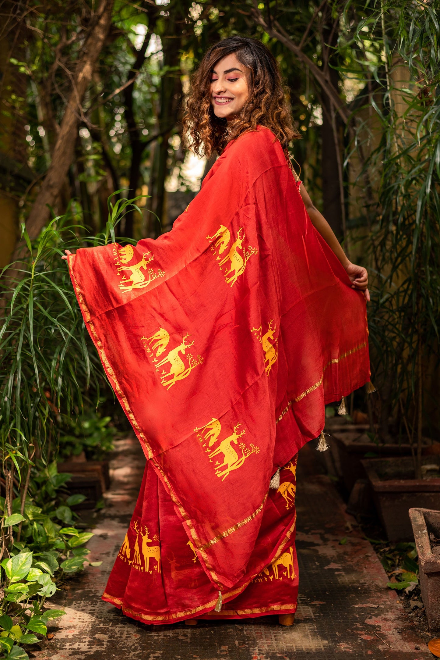 Red chanderi silk saree with ethnic deer motif