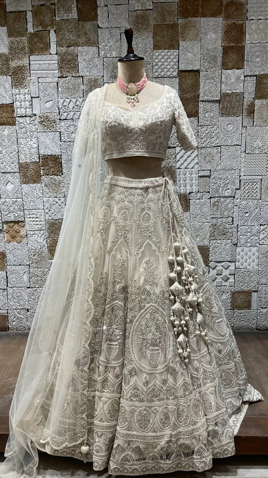 Ivory Cutdana Embroidery Net Bridal Lehenga