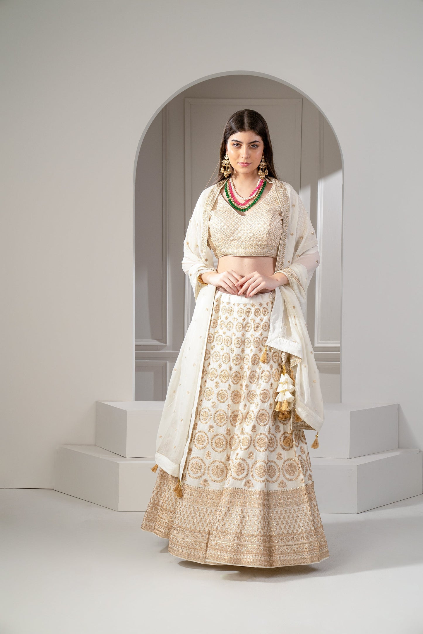 Metallic Gold Organza Silk Sequinned Lehenga Set.