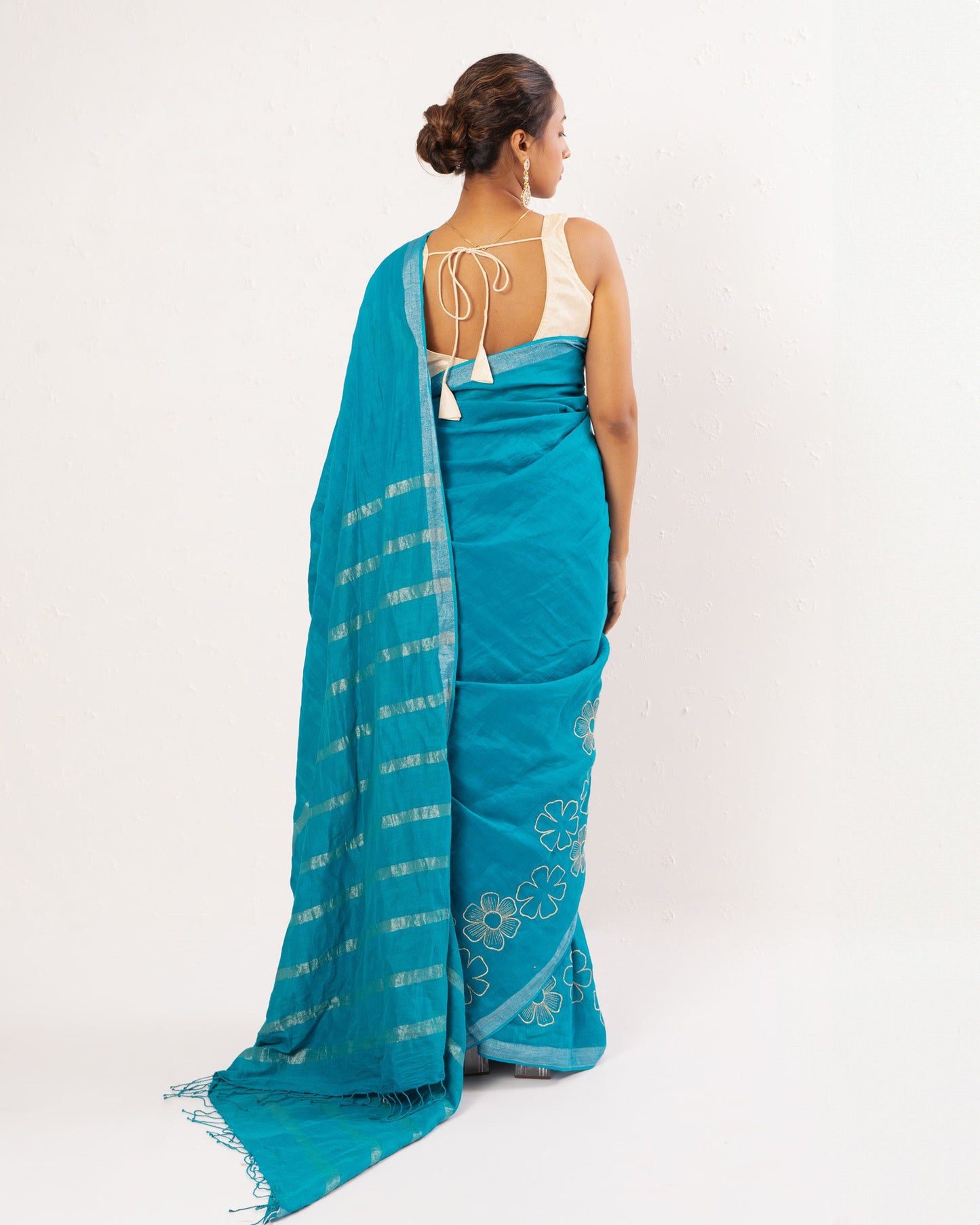 Cyan Blue embroidered handwoven linen saree