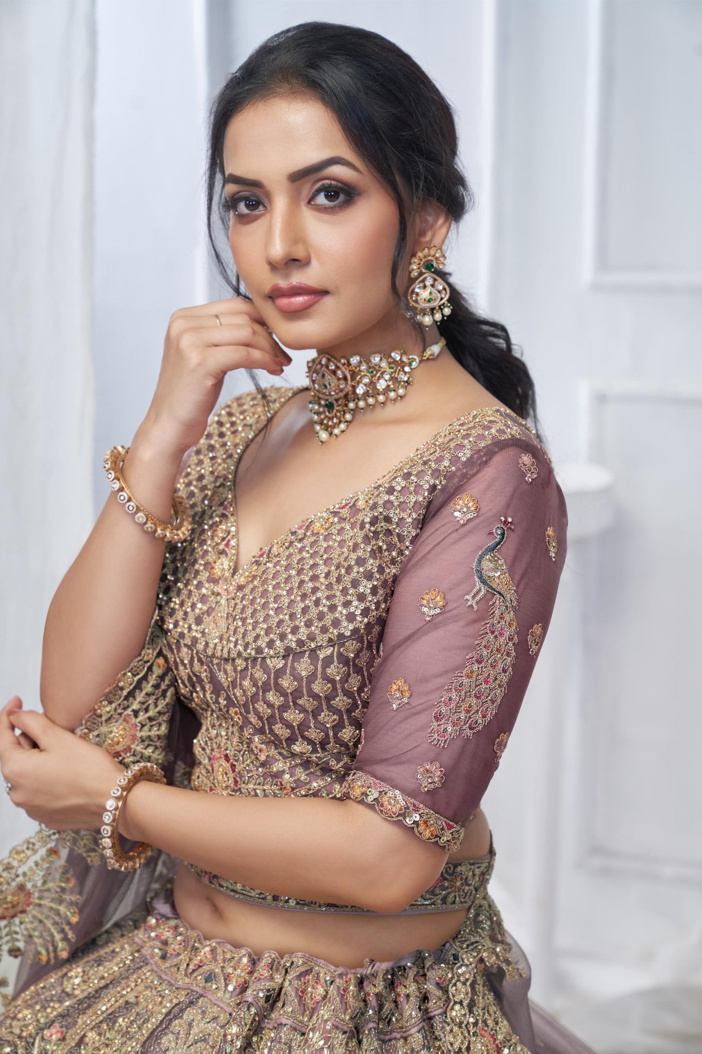 Purple Soft Net With Paisley And Peacock Motifs Bridal Lehenga