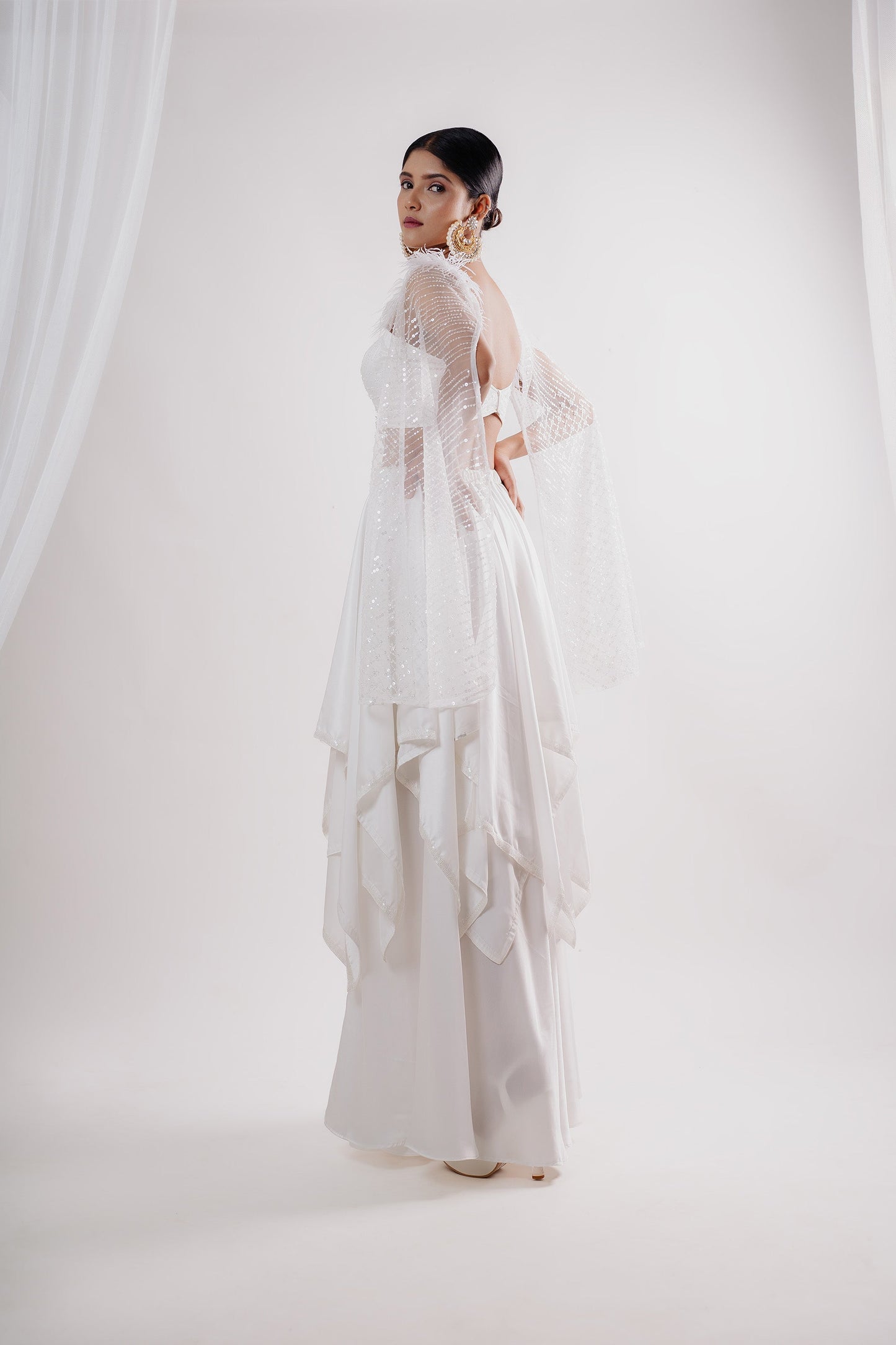 Royal White Two Layer Asymmetric Skirt with Crop Top Embellished with Fur
