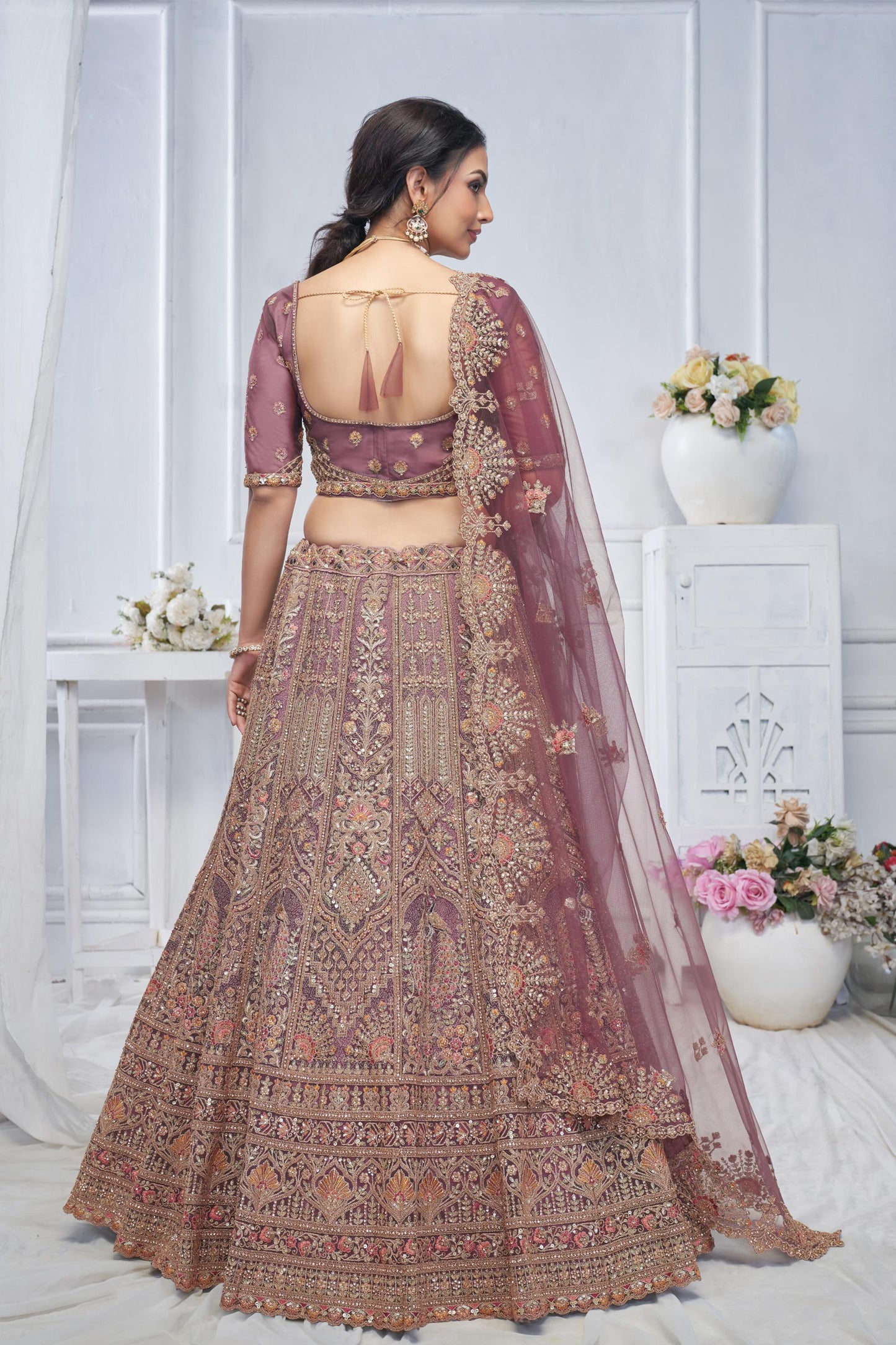 Onion Pink Soft Net With Paisley And Peacock Motifs Bridal Lehenga