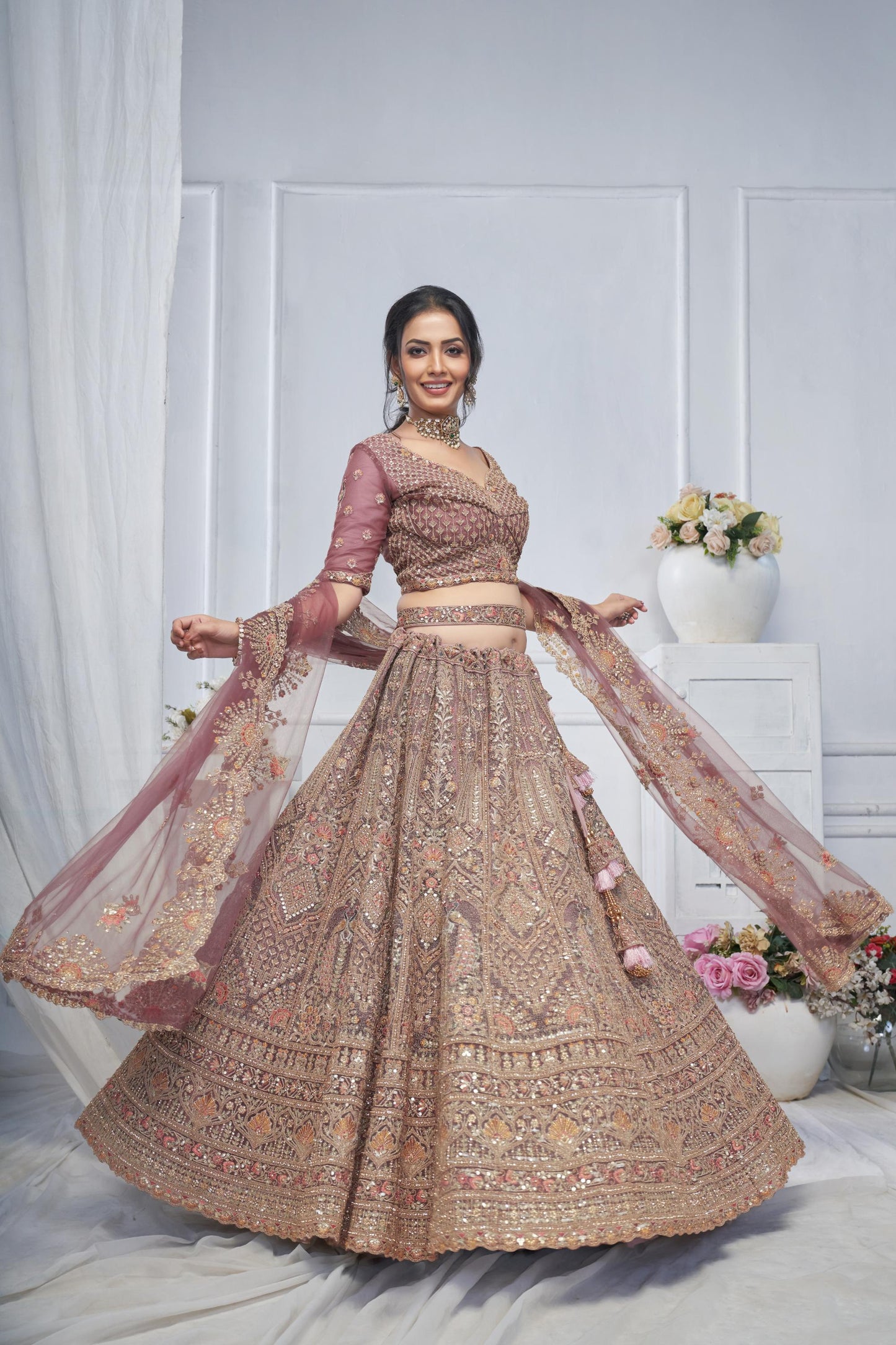 Onion Pink Soft Net With Paisley And Peacock Motifs Bridal Lehenga