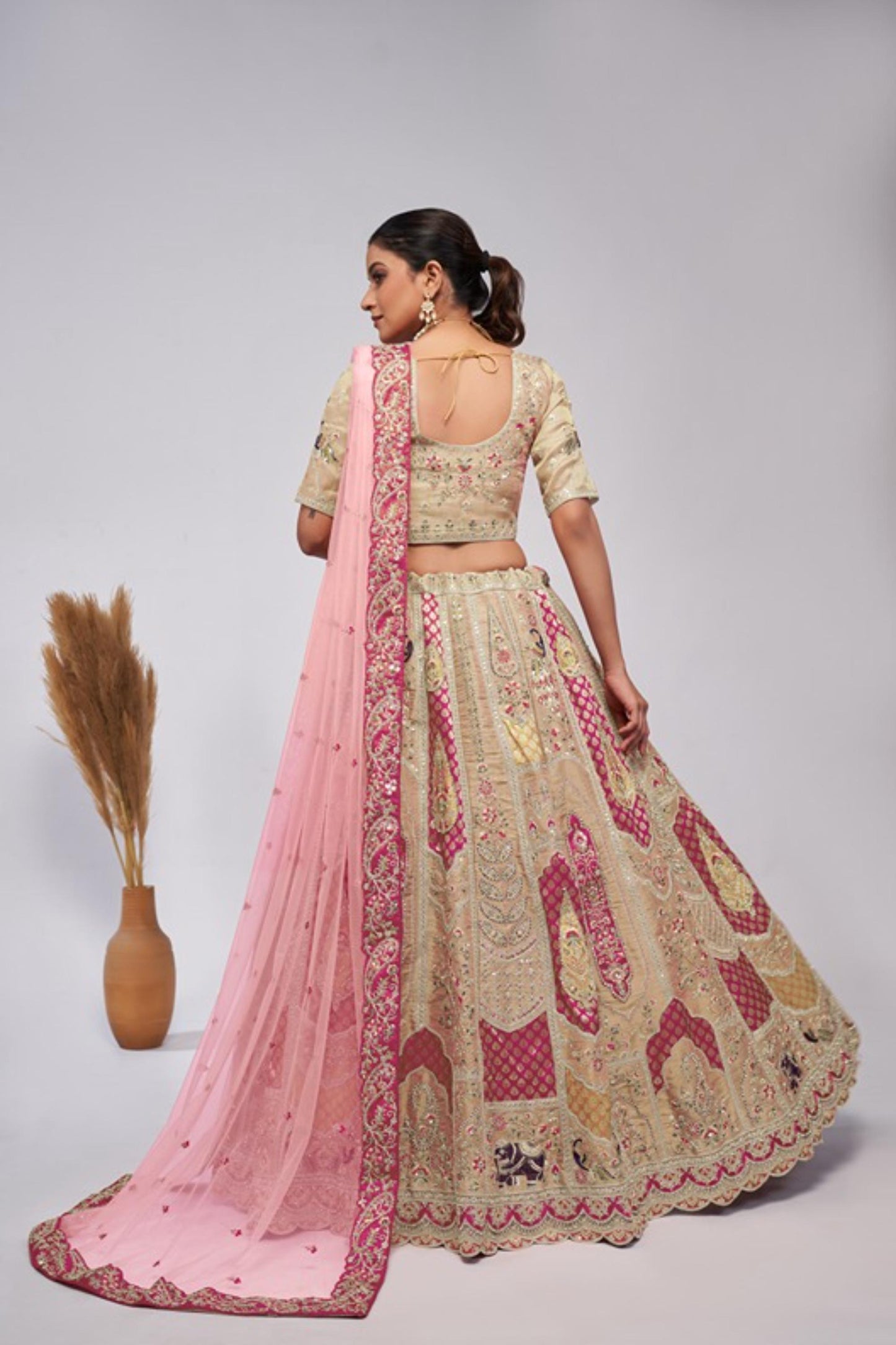 Ivory Silk Heavy Sequins & Motifs Embroidered Sangeet Lehenga