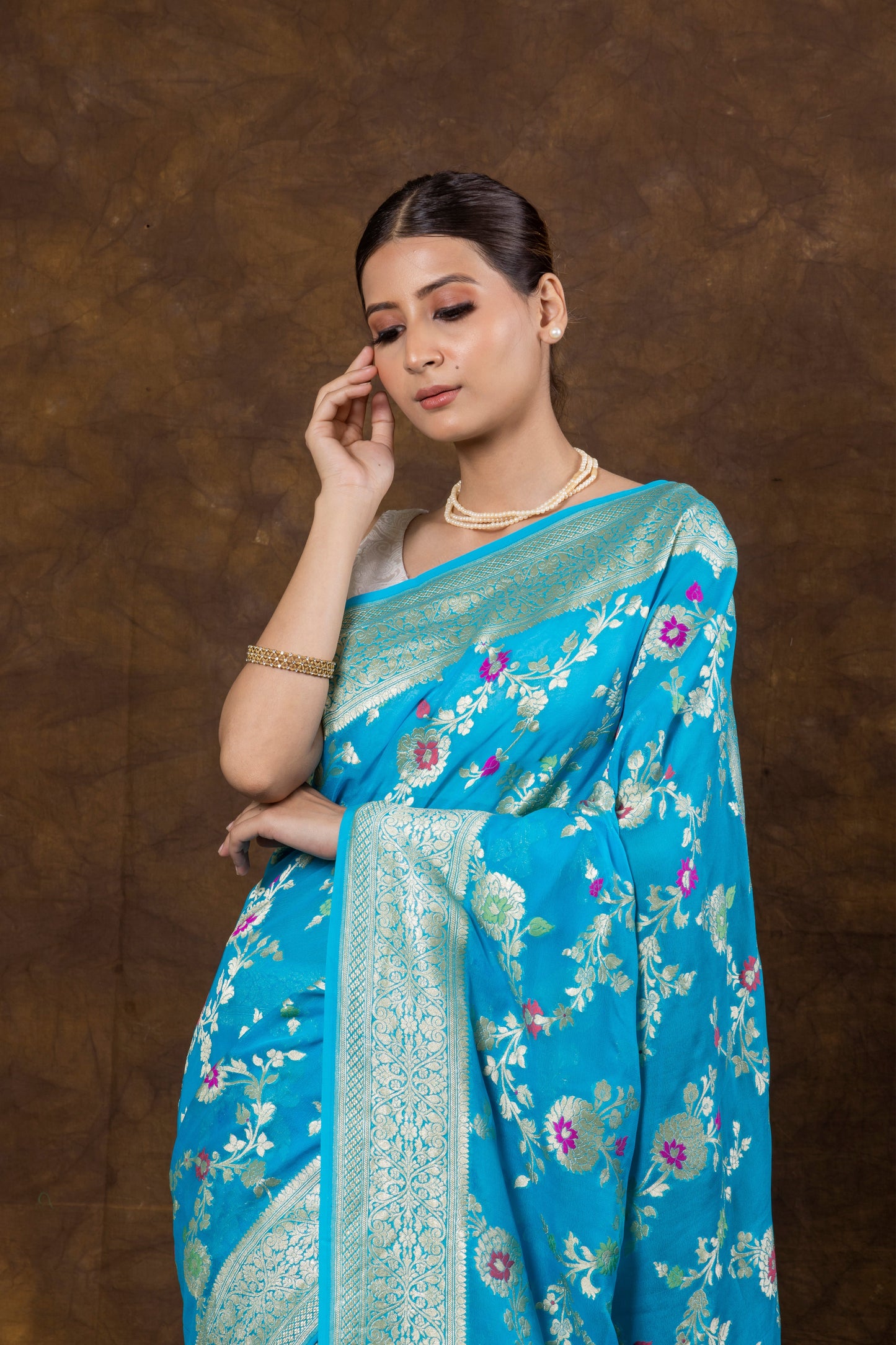 Turquoise Blue Georgette Khaddi Pure Silk Saree