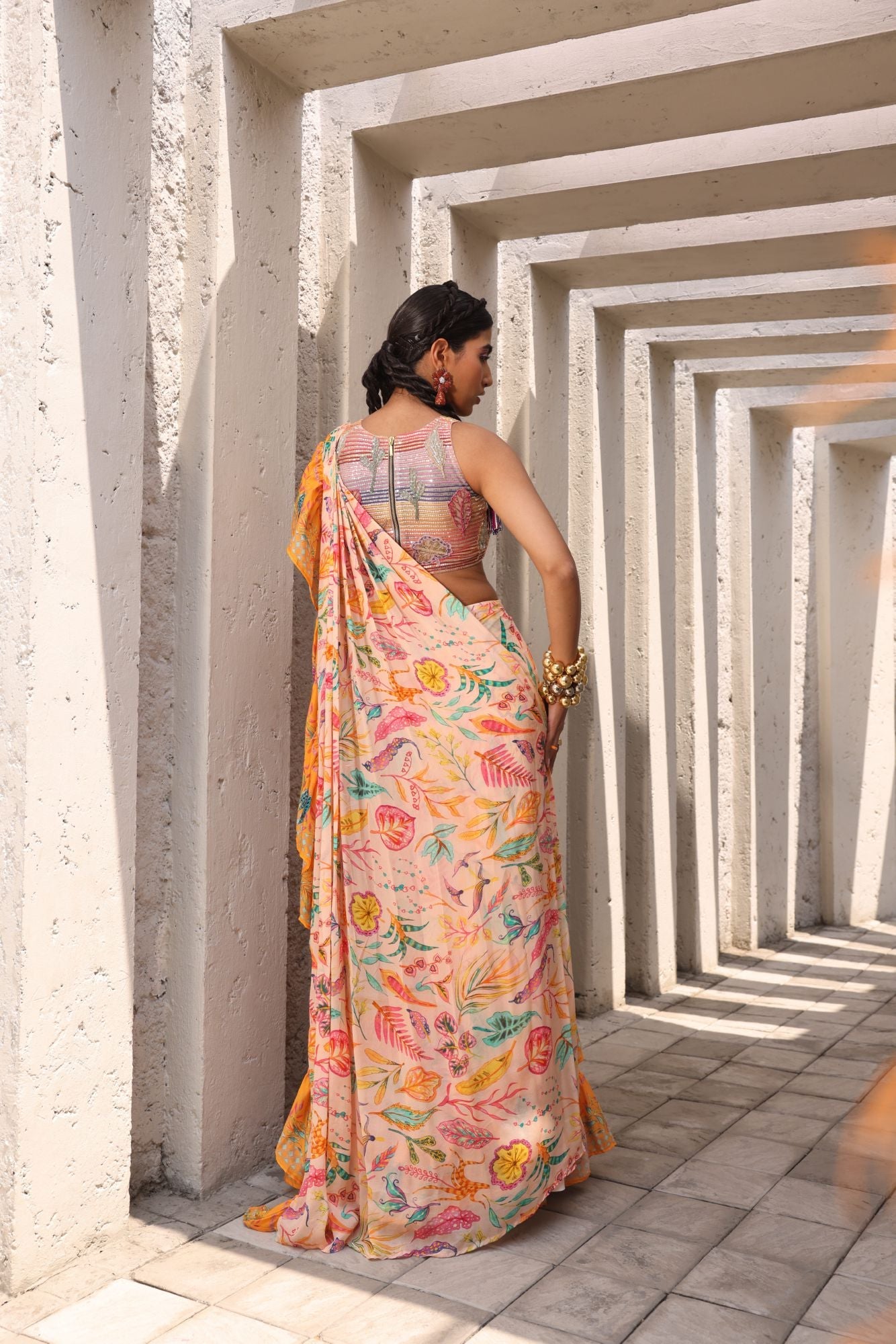 Drape-style Saree with Ruffle details in multi-color floral print