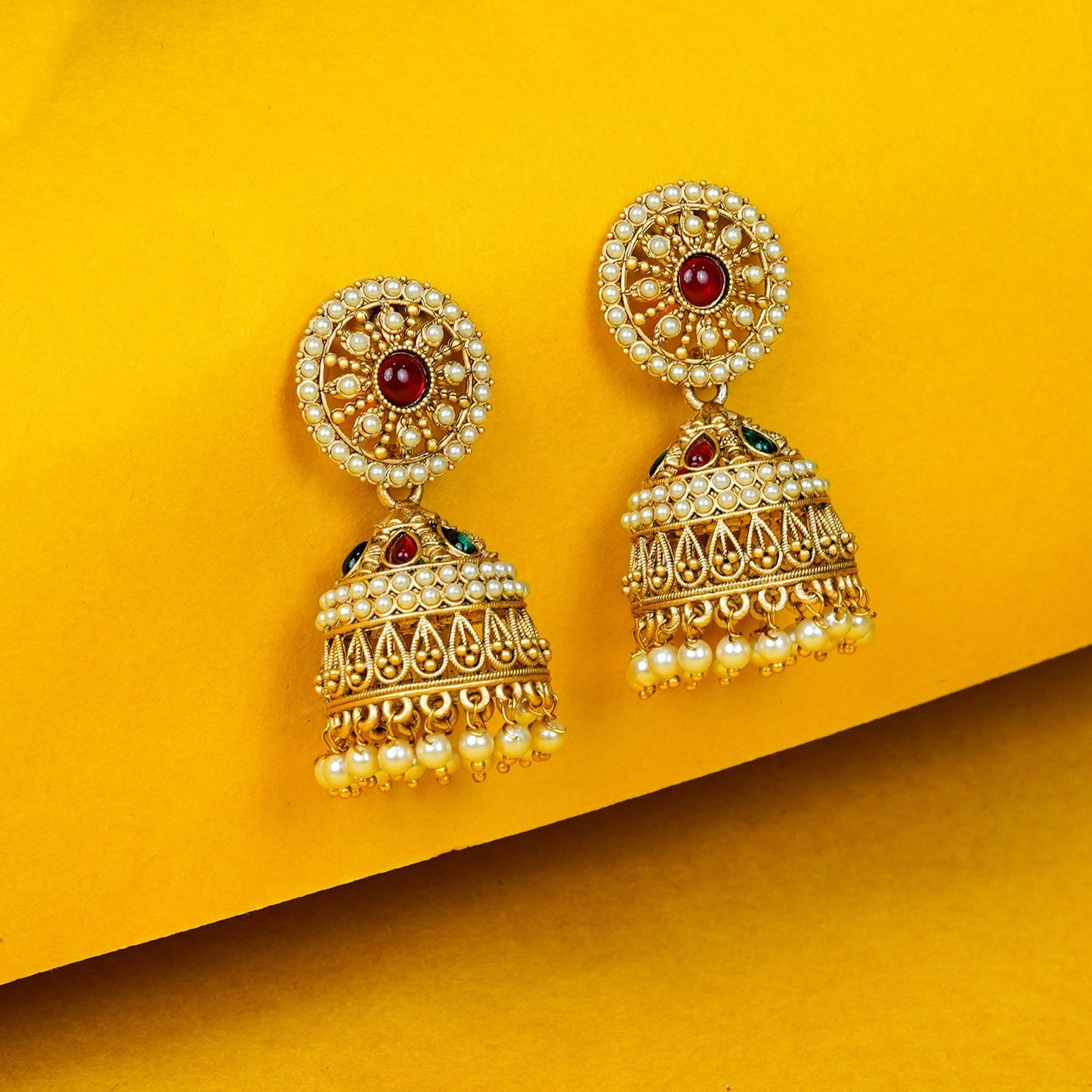 Zevar Club Brass Gold-Toned Floral Stud Jhumka Earrings with Red Green Stones & White Pearls