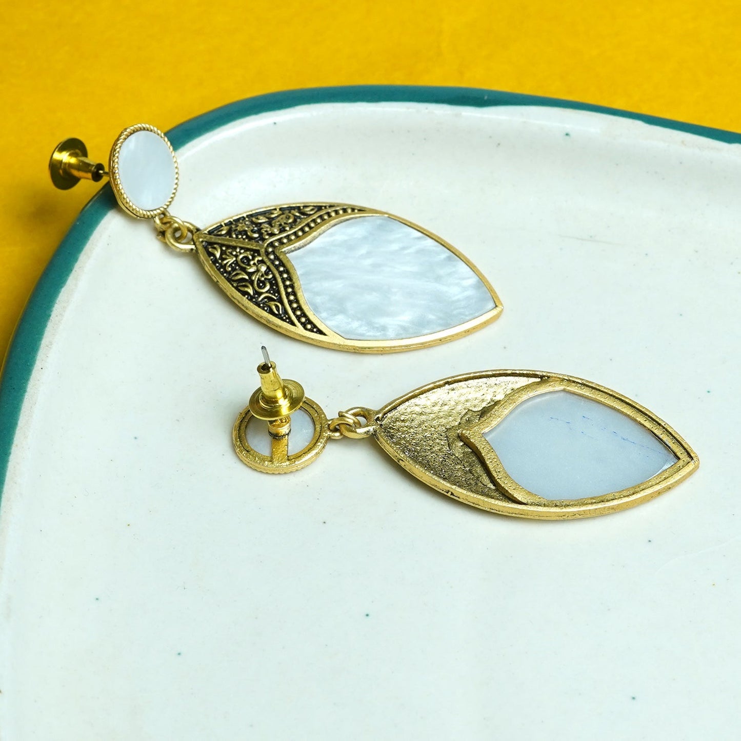 Zevar Club Gold-Toned White Leaf Drop Earrings with Antique Embossed Detailing