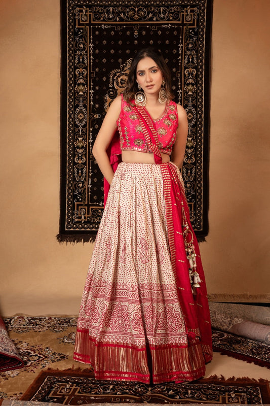 Pink gaji silk lehenga choli with zardosi, moti, and mirror work