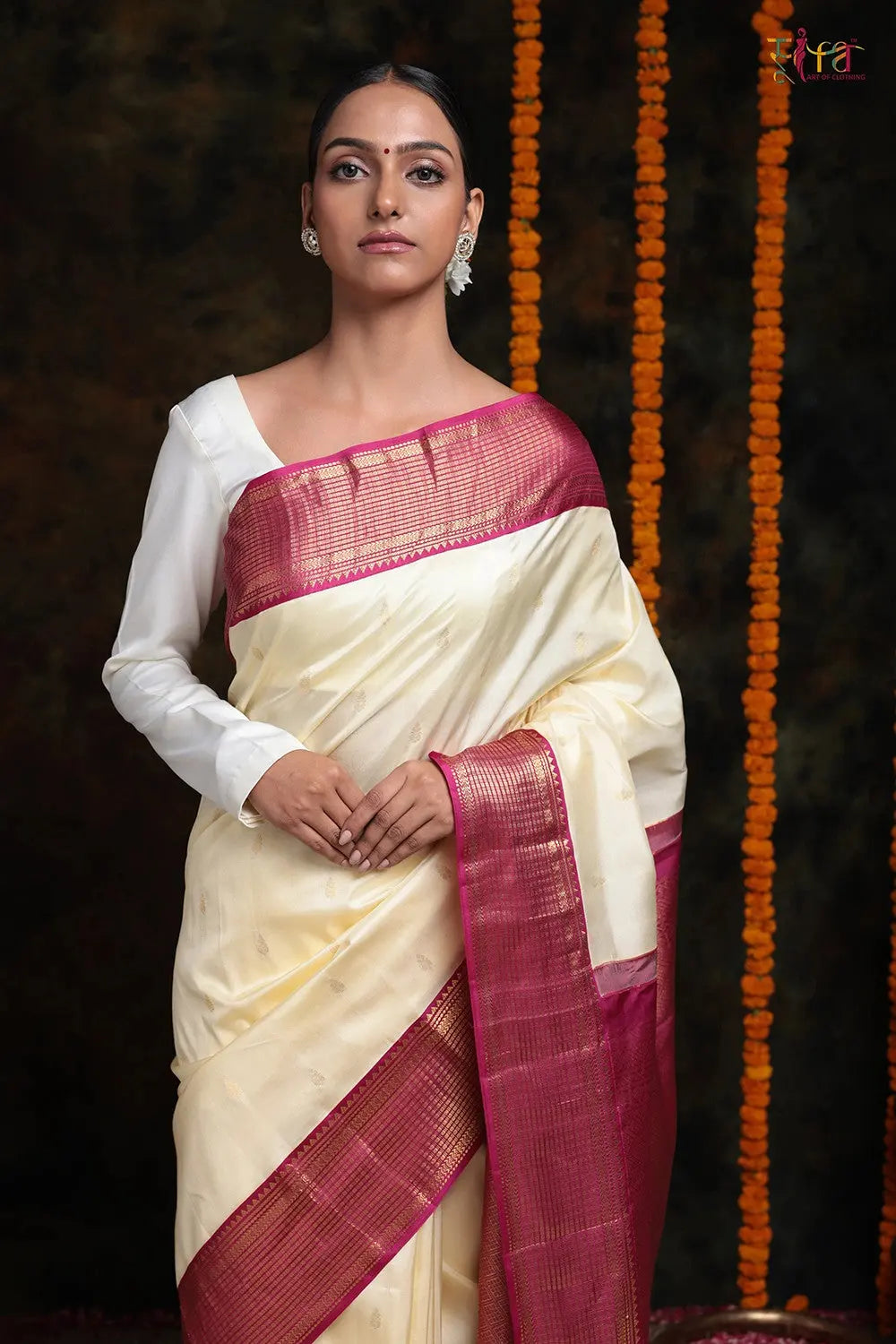 Handloom Cream Kanchipattu Saree With Hot Pink Golden Zari Border
