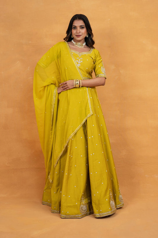 Mustard yellow soft silk zardozi embroidered lehenga choli with hand cut dana and sequin work