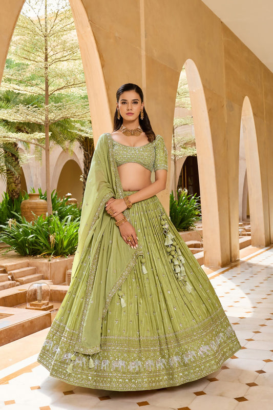 Palm green silk lehenga choli with sequins and hand cut dana work