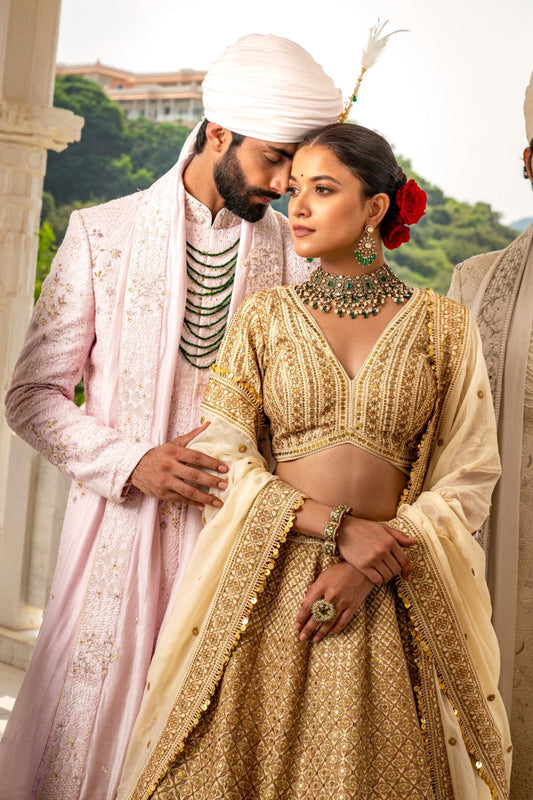 Golden silk lehenga choli with marodi and pita work