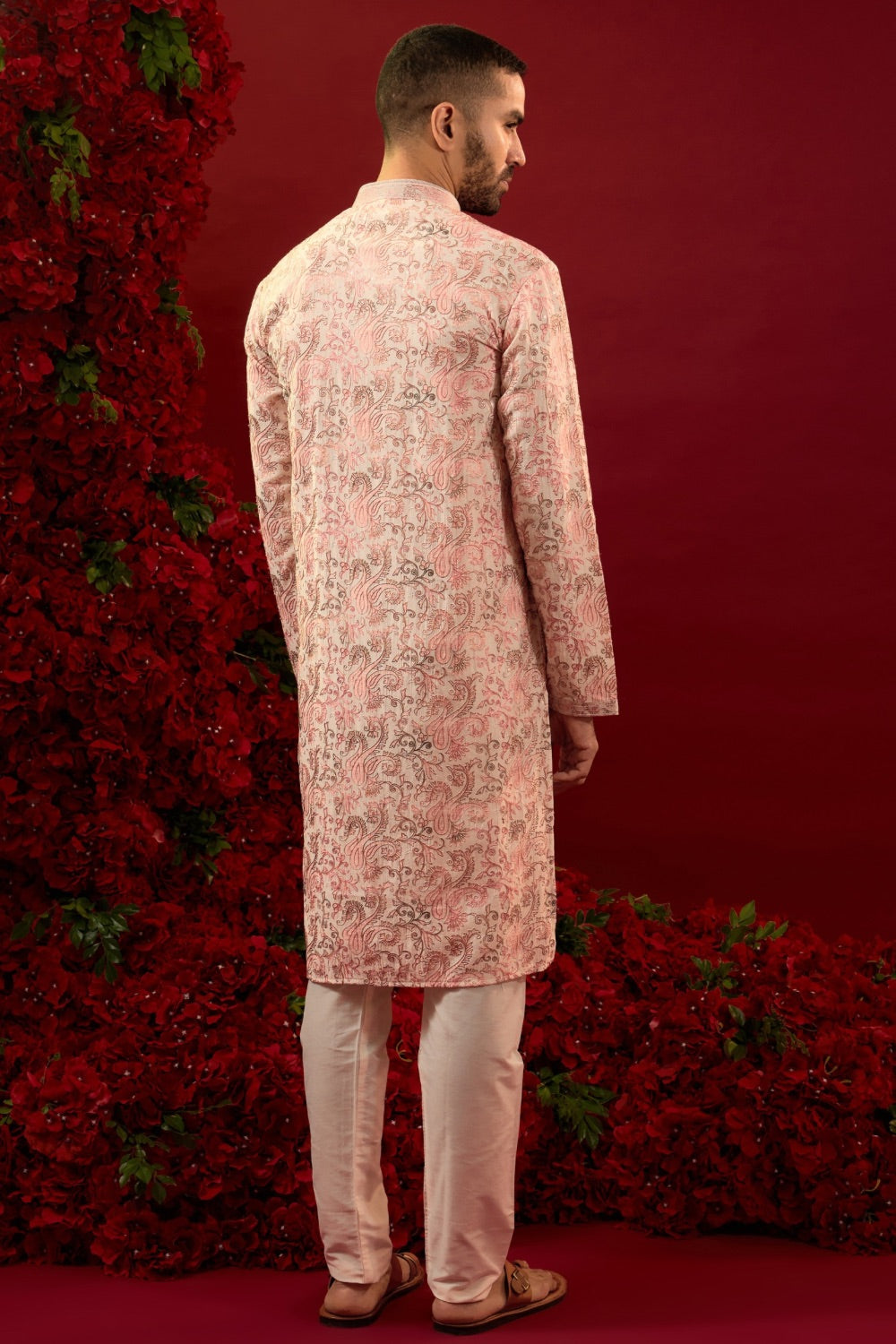 Peach silk kurta set with hand and machine work