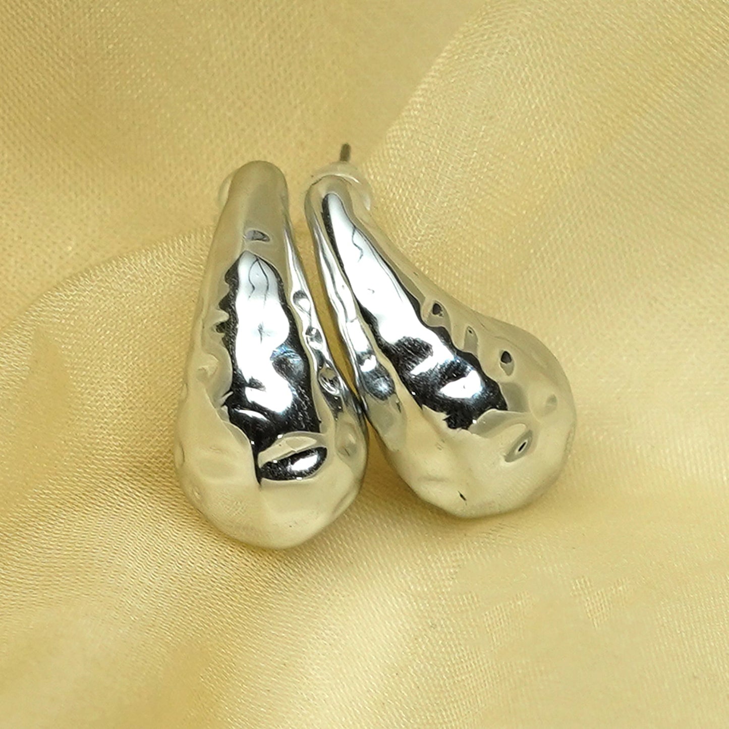 Zevar Club Glossy Silver Tone Stainless Steel Tarnish Free Waterproof Sculpted Tear Drop-Shaped Stud Earrings for Women