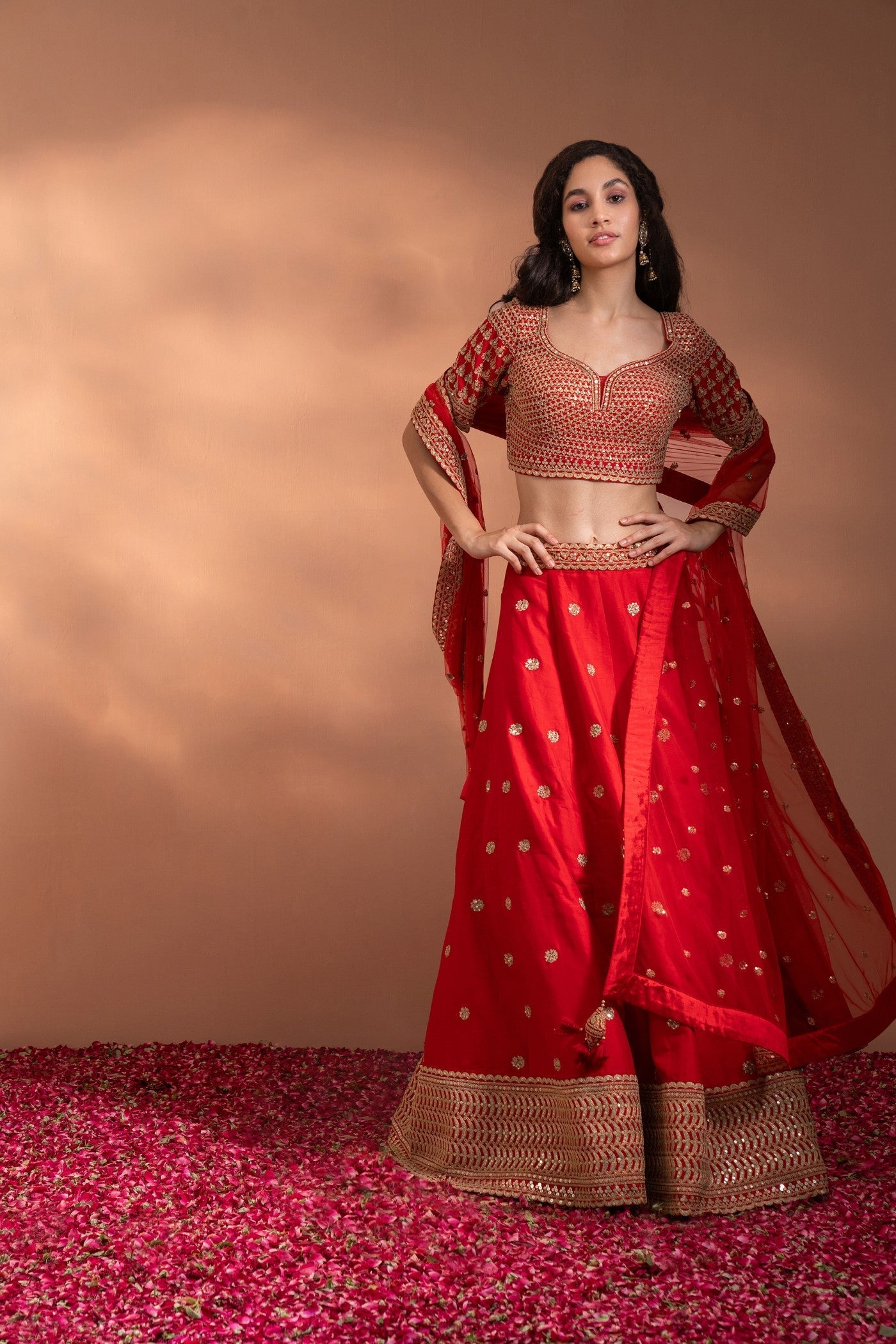 Bright Red Lehenga set in Silk with Heavy Gota & Embriodery Work.