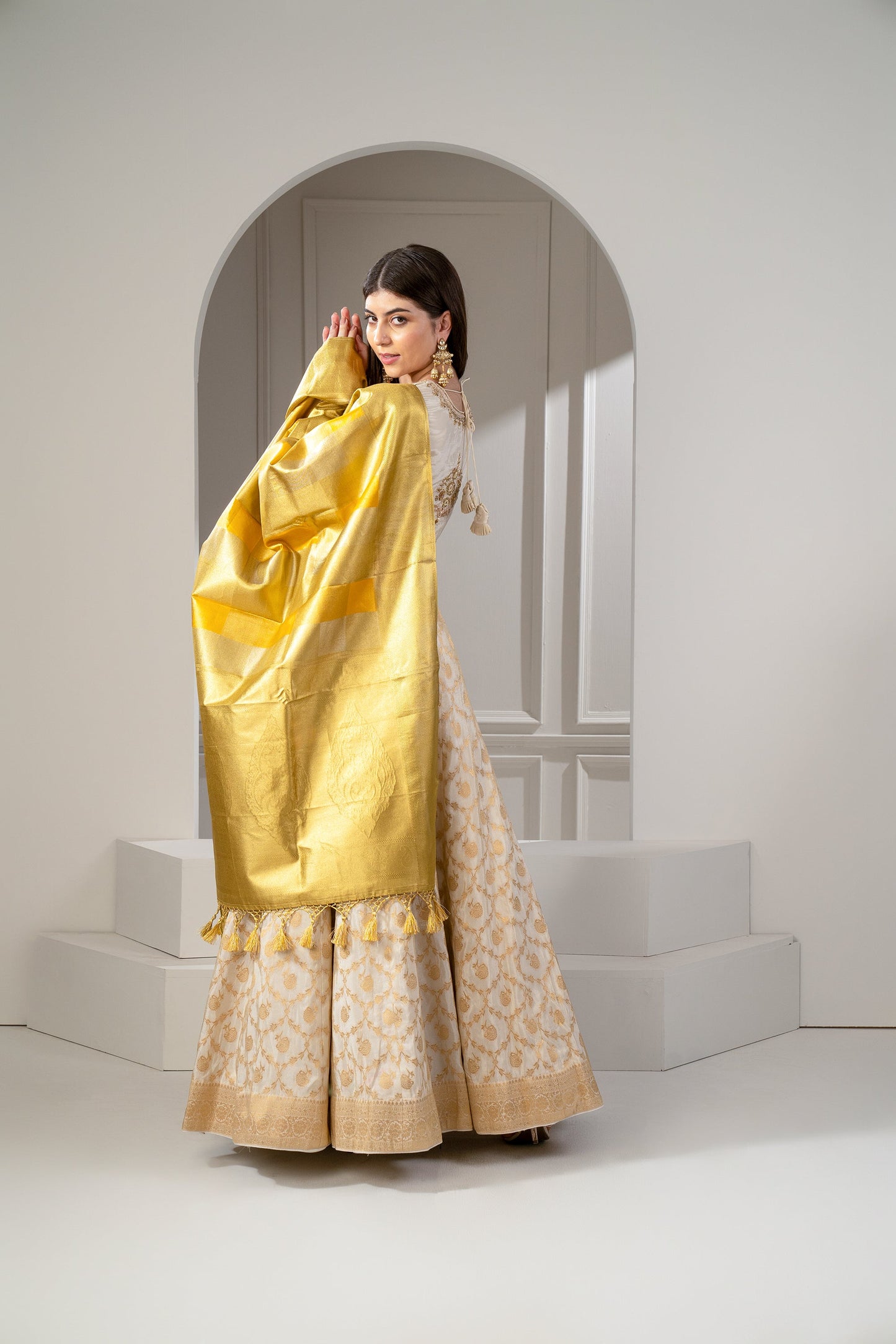 Sunglow Golden And Beige Banarasi Silk Zari Embroidered Lehenga Set.