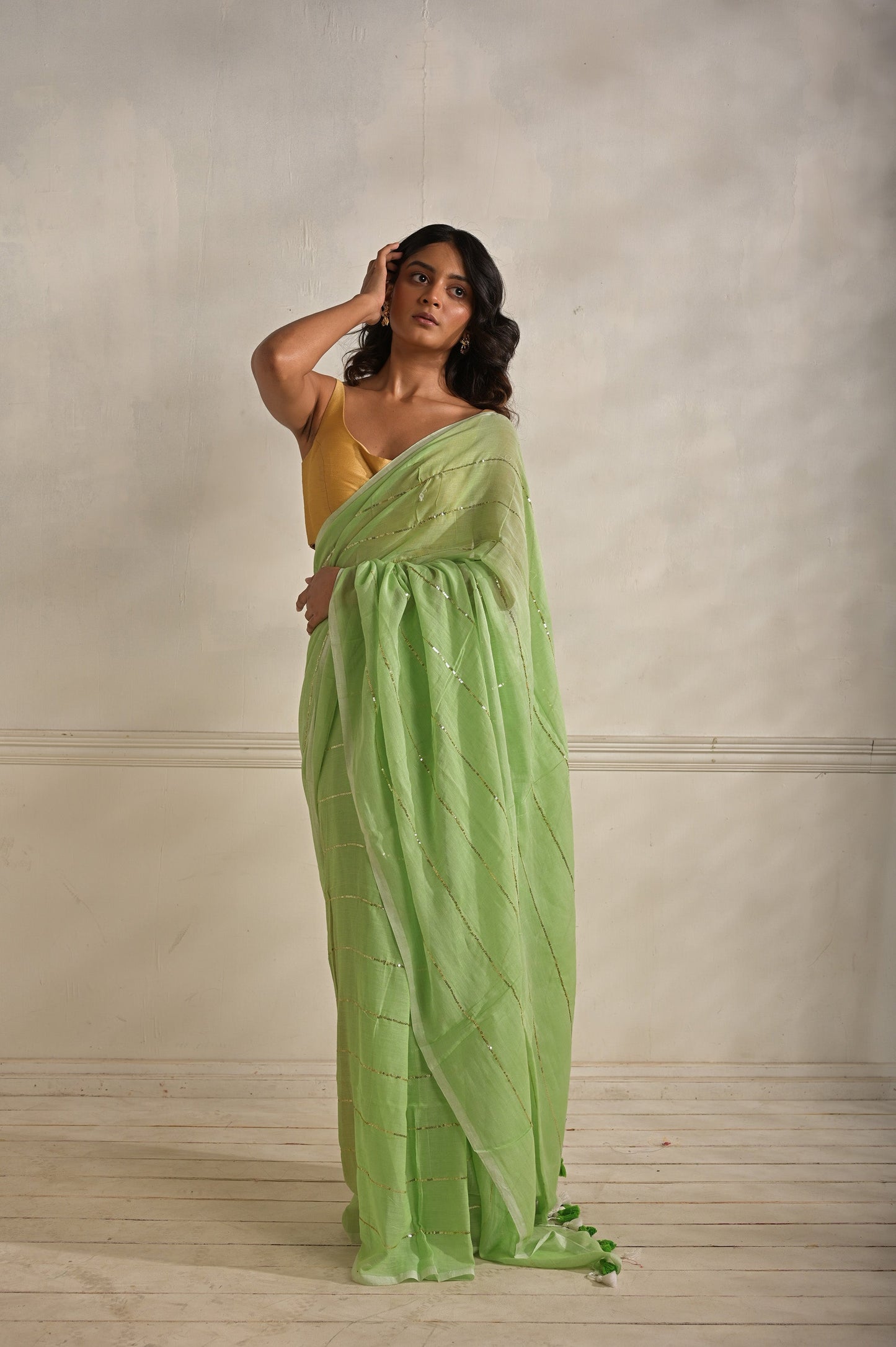 Miraya | Mint Green Handloom Mul Cotton saree with sequined lines