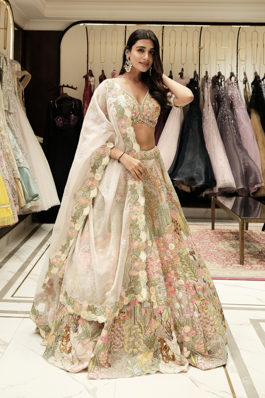 Multicolour organza lehenga choli with sequins and pearl work