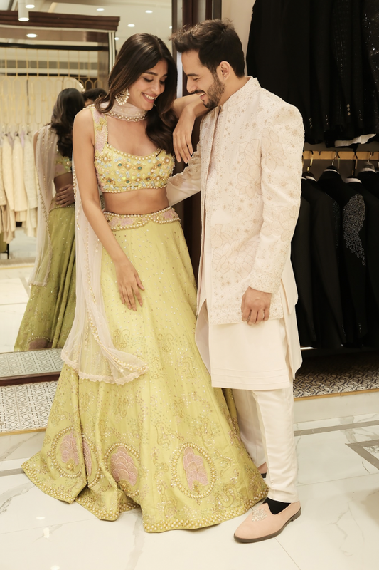 Lime green silk lehenga choli with hand cut dana and peal work